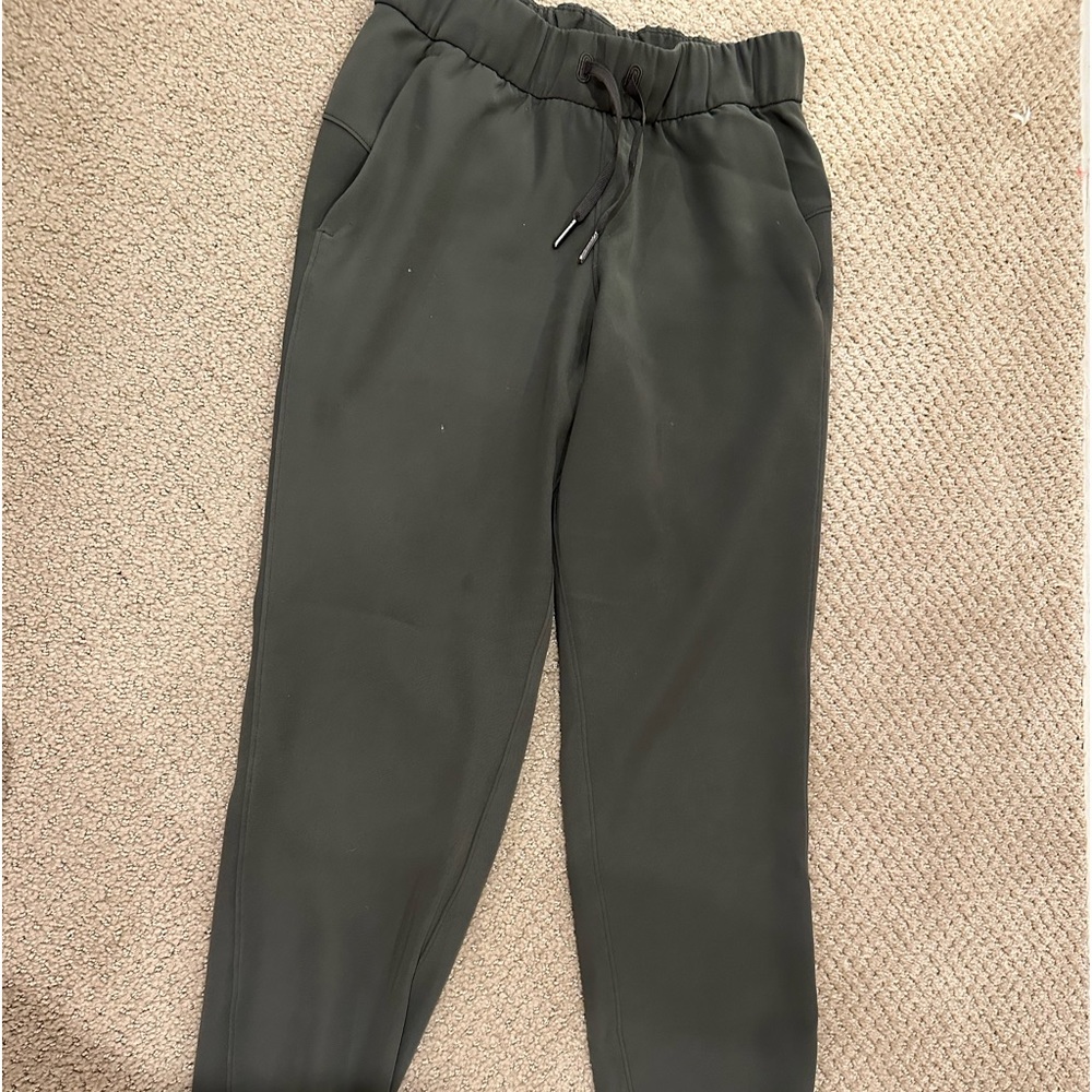 Lululemon: sage green color, dry fit material, athletic joggers